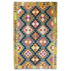 Maimana Kilim rug in shades of green, decorated with stepped lozenges 