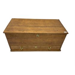 18th century oak mule chest, the hinged lid with applied moulding, plain front fitted with single long drawer, pressed brass escutcheons 