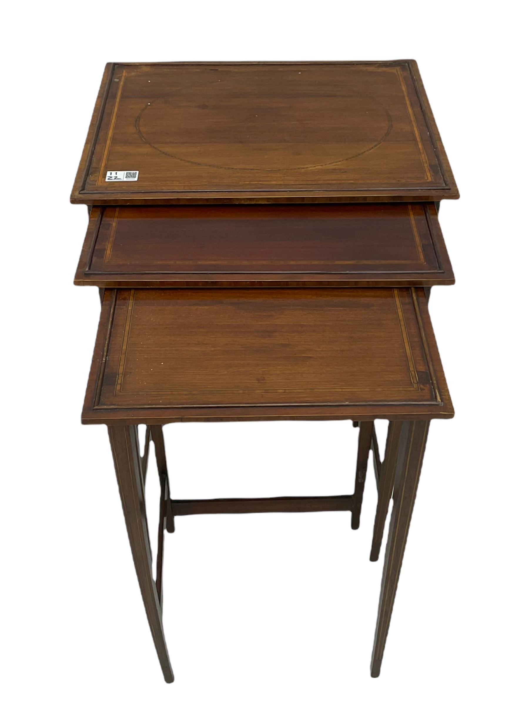 Edwardian mahogany wall hanging corner display cabinet, projecting dentil cornice over astragal glazed door (W56cm, H93cm), and an Edwardian mahogany nest of three tables (46cm x 36cm, H60cm)