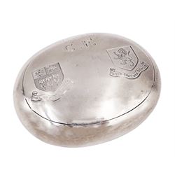 Early 20th century silver squeeze action snuff box, of oval form, engraved verso C.F. Rockcliffe, Darlington, the hinged lid engraved with initials CF and the crests for both Harrow School and Eton College, opening to reveal a gilt interior, hallmarked George Unite, Birmingham 1919, L8cm