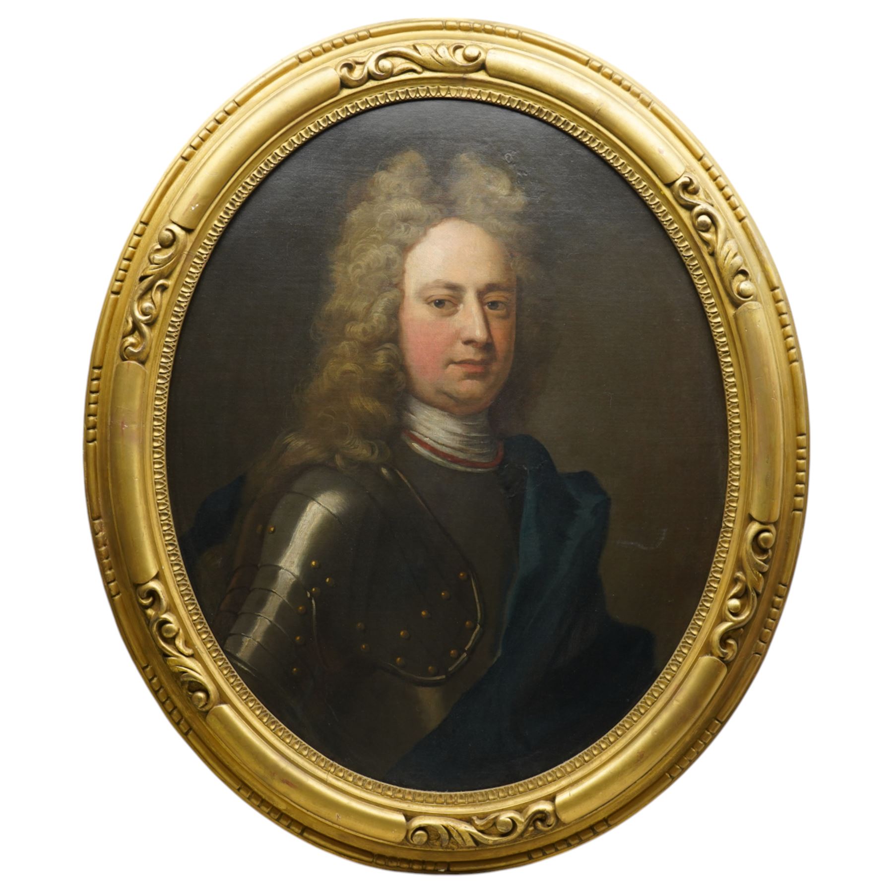 Attrib. Sir Godfrey Kneller (German/British 1646-1723): Portrait of John Churchill - 1st Duke of Marlborough wearing a Suit of Armour and Navy Sash with Full-Bottomed Wig, early 18th century oval oil on canvas unsigned, remains of 19th century sale catalogue verso 74cm x 60cm
Notes: the remains of the sale catalogue from which this was purchased in the 19th century reads: 'KNELLER - The Duke and Duchess of Marlborough - a pair - ovals'. The blue sash is indicative of the Order of the Garter.