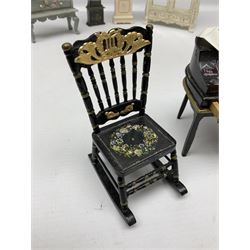 Collection of miniature dolls house furniture, to include five drawer chest painted with blossom, cream and gilt double door mirrored wardrobe, four piece lacquered style desk set, three piece suite, writing desk, wash stand, Knoll style sofa etc (14)