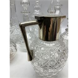 Victorian Silver plate mounted claret jug by Mappin Brothers, together with nine glass decanters 