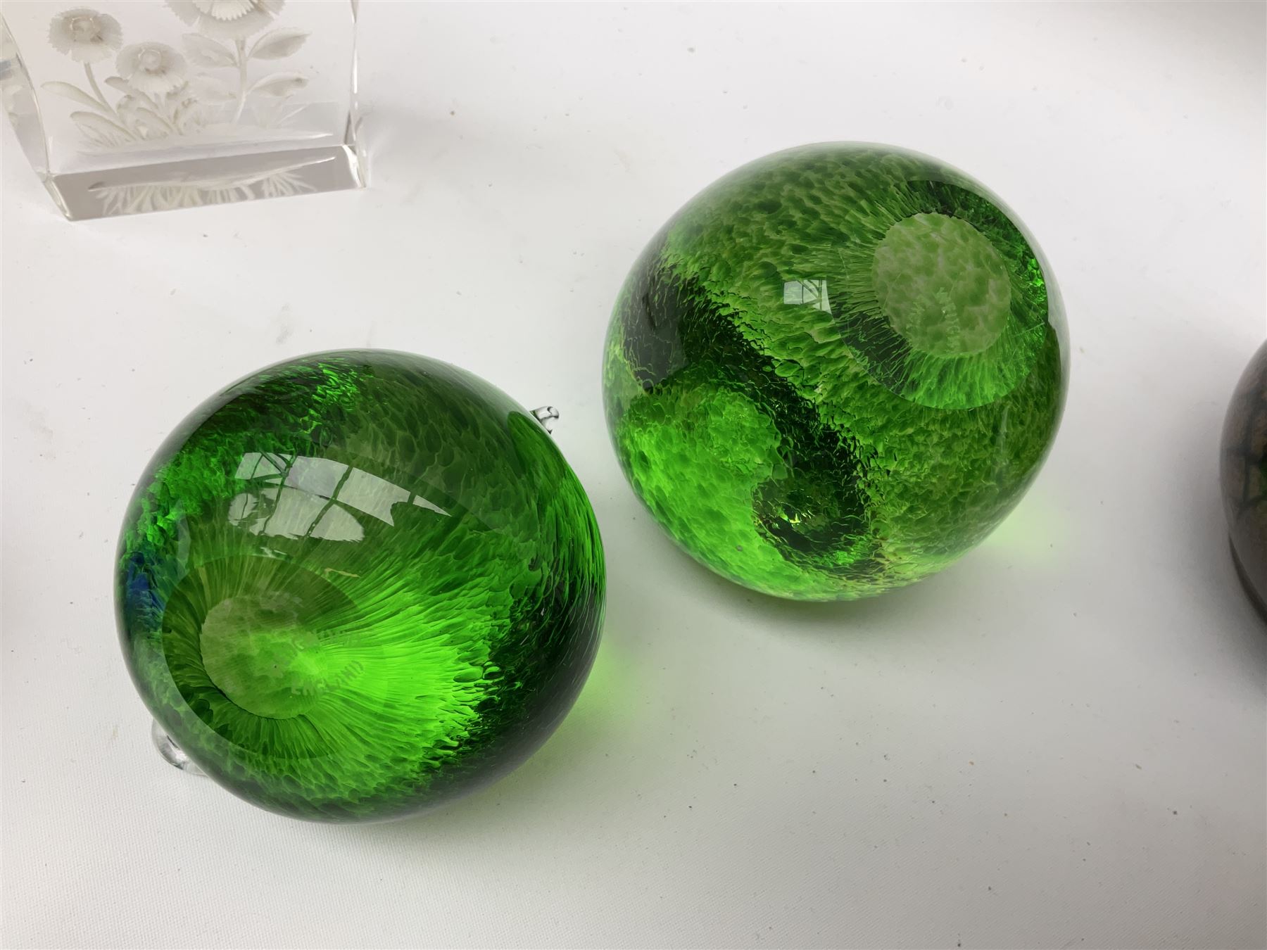 Collection of glass paperweights to include three Wedgwood examples modelled as birds, two Rosenthal faceted examples, a millefiori example, together with art glass examples to include Eirian swirled teardrop and another teardrop shaped paperweight by Caithness