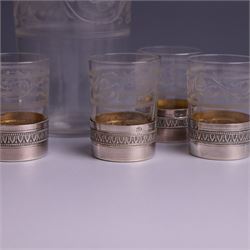 French silver mounted glass decanter and shot glass set, the decanter with silver covered stopper, removable silver collar, and etched decoration to glass body, the six silver mounted glasses each with etched decoration, silver stamped with Minerva's head, decanter H 21cm