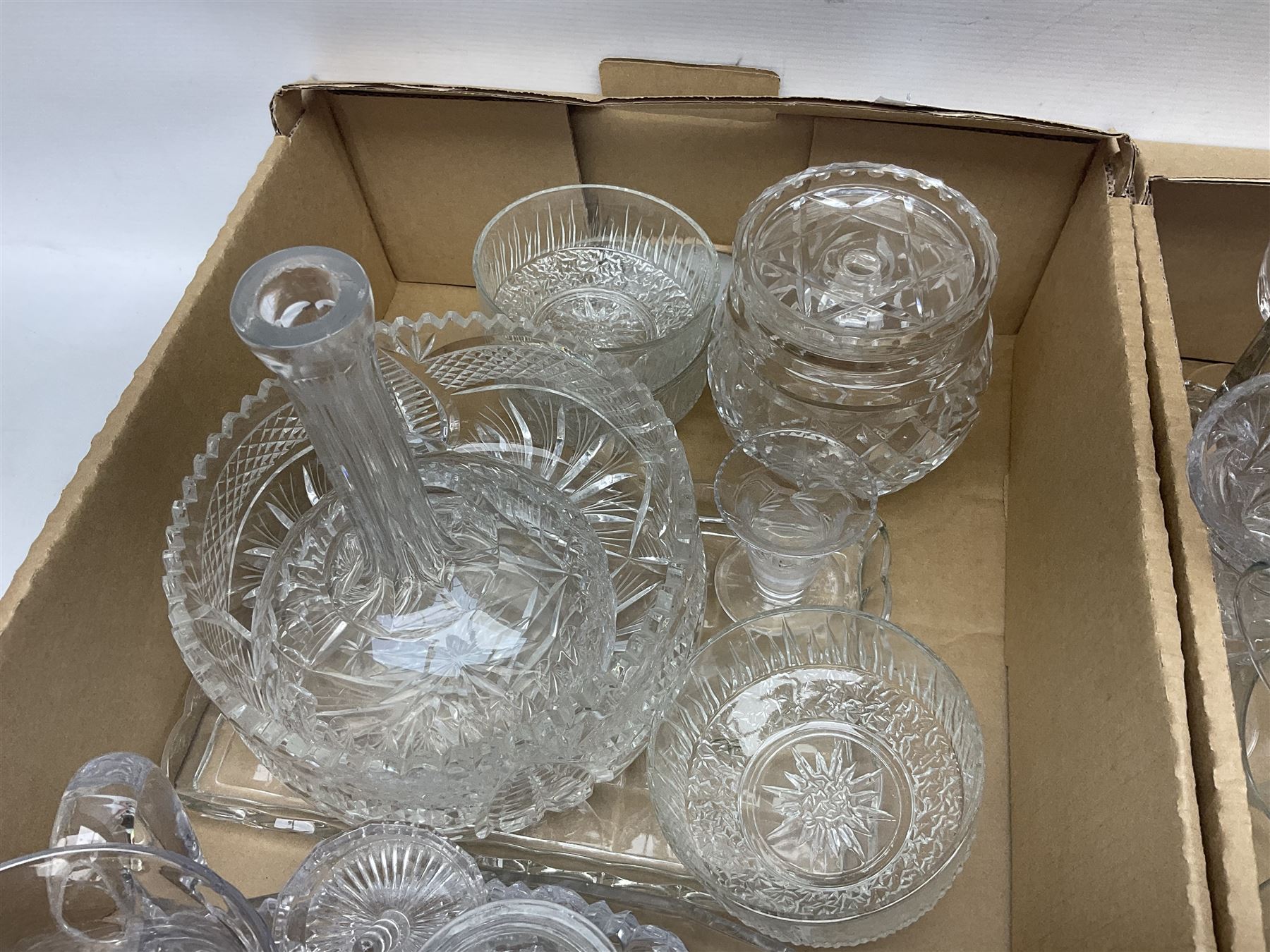 Four boxes of glassware to include painted vases, jugs, drinking glasses, art glass vase etc