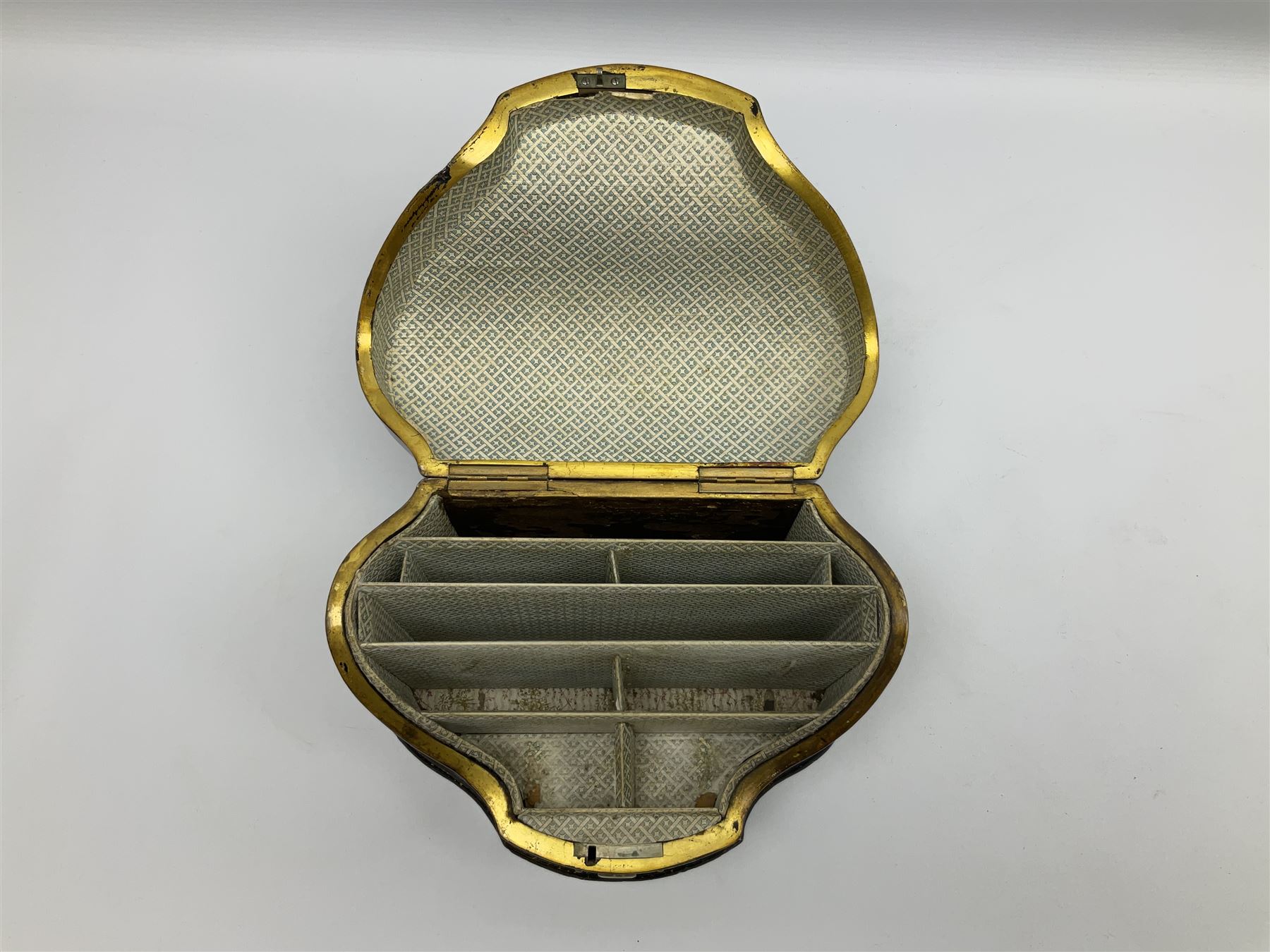 Victorian papier-mâché stationary box, of rounded wedge form with mother of pearl escutcheon, the hinged and curved cover and sides hand painted with floral sprays, opening to reveal a lined and fitted interior, H15cm L22cm D16cm
