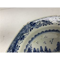18th century Chinese Famille Rose plate, with painted decoration of a bird upon branch with peonies, together with three Chinese blue and white plates, each decorated with a river and pagoda scene, largest D23cm