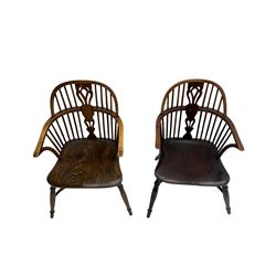 Pair elm Windsor armchairs, double hoop and stick back with shaped and pierced splat, dished seat, on turned supports joined by crinoline stretcher 