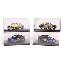 Four Troufeu 1:43 scale diecast model rally cars, including two limited edition Subaru's c...