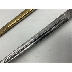 WW2 German kreigsmarine style dagger composed from various age parts, the post-war 25cm double fullered blade  with etched decoration and inscribed WKC with knight's head; in gilt brass scabbard with two rings L42cm overall