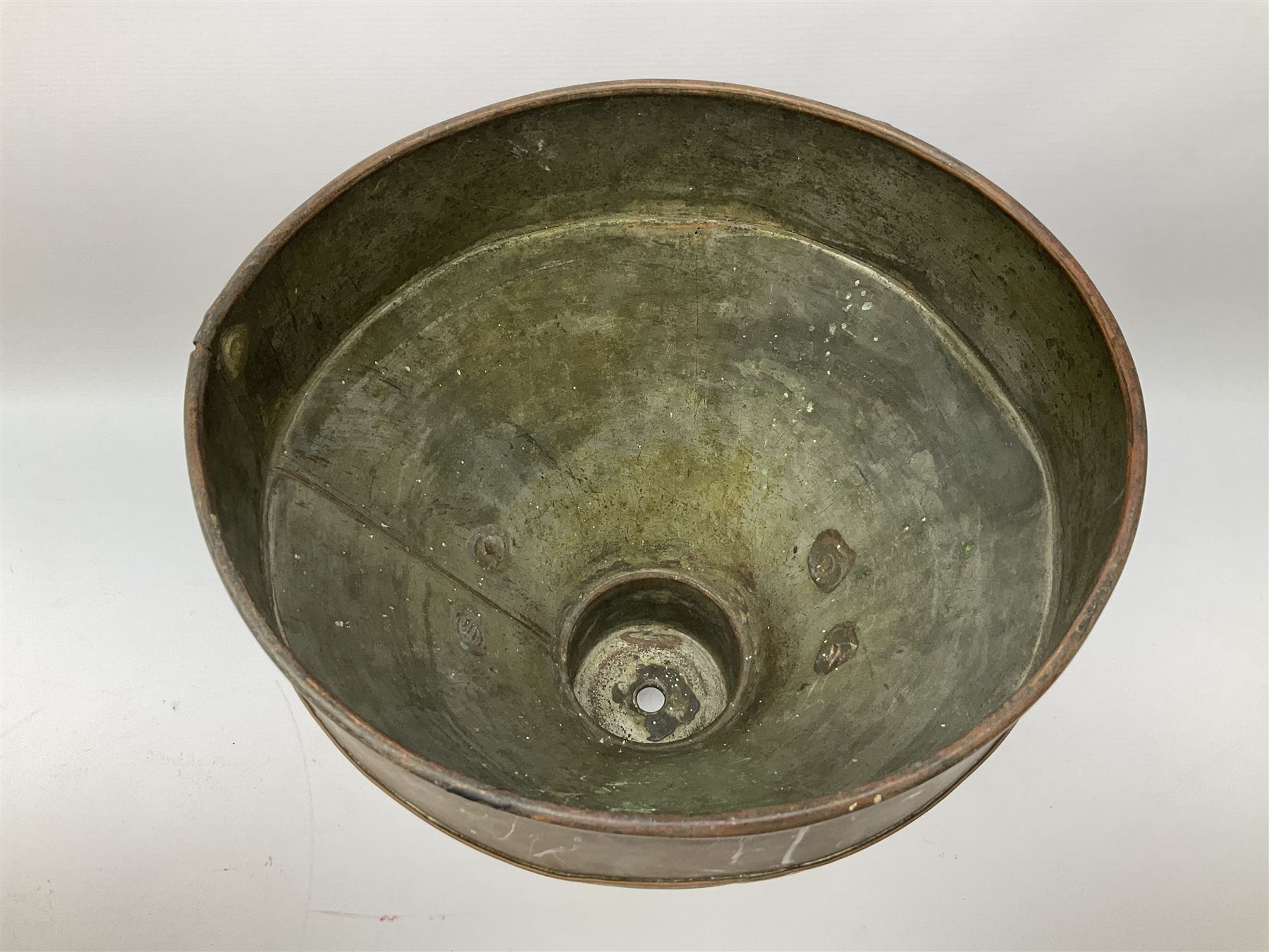 Agricultural copper corn funnel, H32.5cm, another similar copper funnel and copper warming platter of oval form, with twin handles on four supports, with removeable warming plate, L49cm