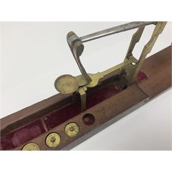 Brass sovereign scales and a part set of Georgian folding sovereign scales (one weight missing)