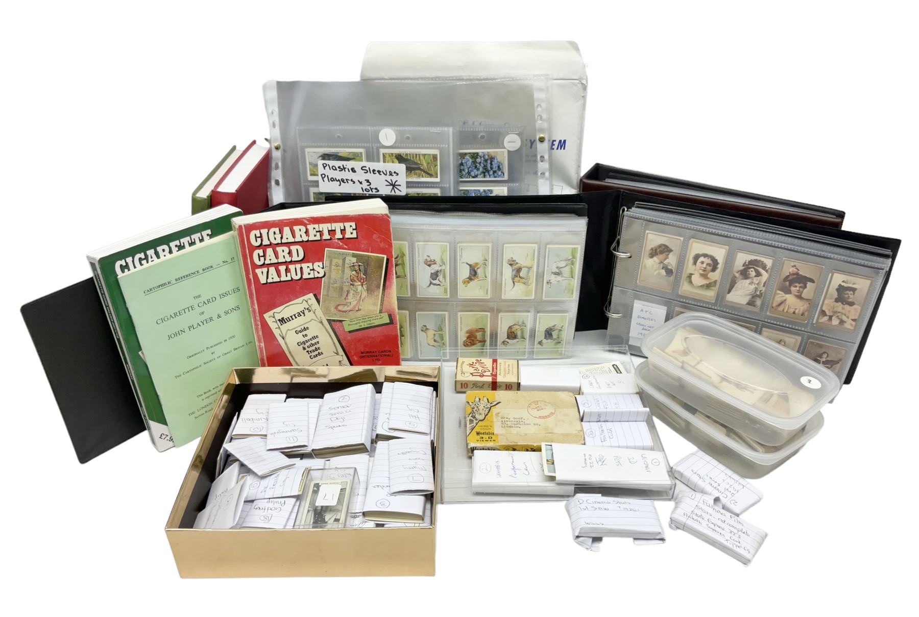 Quantity of mostly cigarette cards, housed in ring binder albums and loose, by Ardath, W.D. & H.O. Wills, John Player & Sons, The American Tobacco Co etc, including famous film stars, cinema stars, wild birds, poultry, dogs etc and various books or catalogues relating to cigarette card collecting, in one box