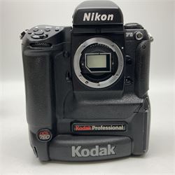 Canon EOS 1n Digital camera body, serial no. 260436, with 'Canon Zoom Lens EF 35-80mm 1:4-5.6 II Canon Inc. 52mm' lens, Kodak Professional DCS 520 digital module, and charger, serial no. K520C03165, together with Nikon F5 camera body with Kodak Professional DCS 760 digital module and charger, serial no. K760C03802