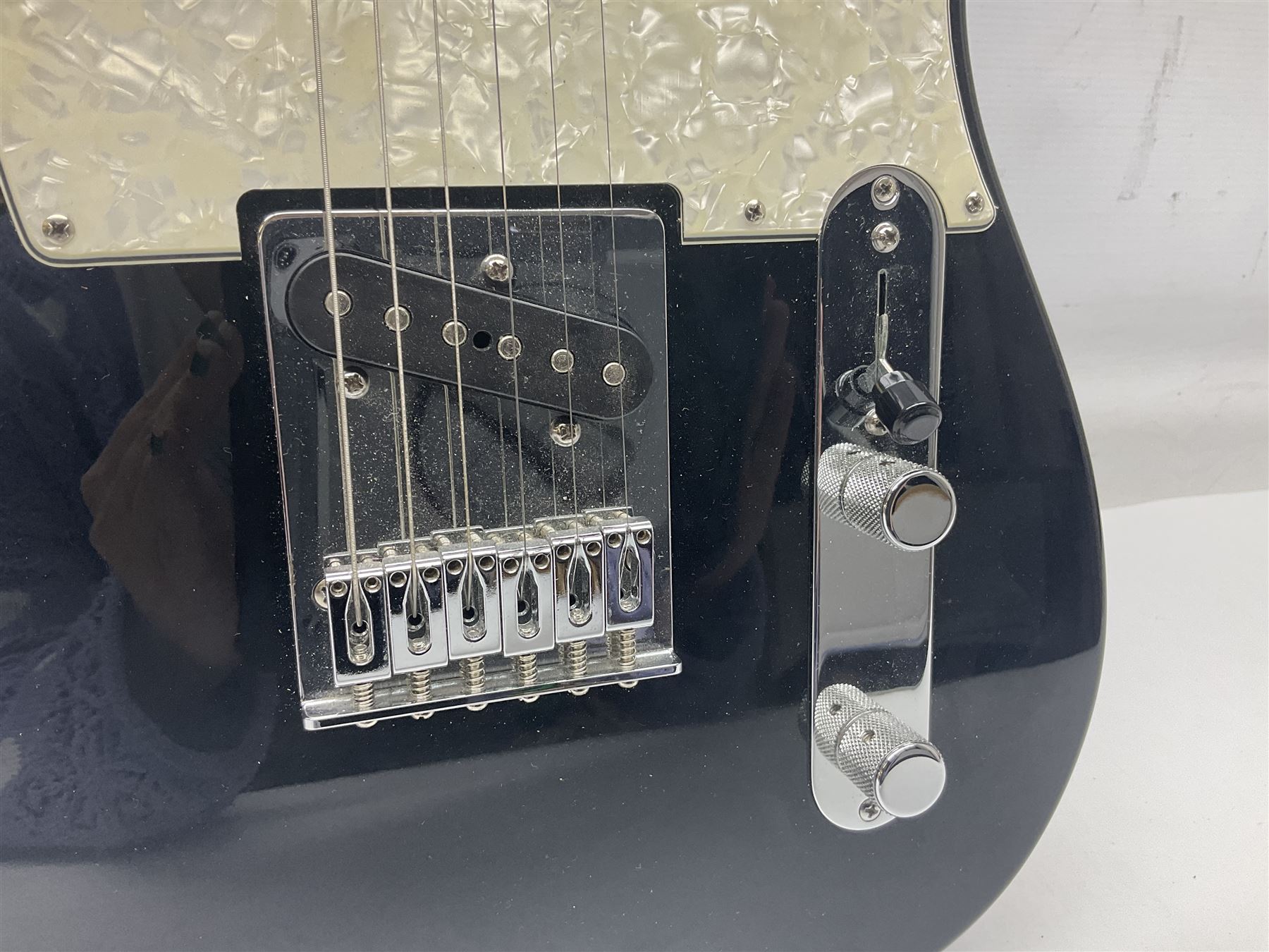 2009 Fender Telecaster electric guitar in black, retro fitted with Charlie Christian copy pick-up, serial no.MZ9546274; L98cm; in Fender soft carrying case