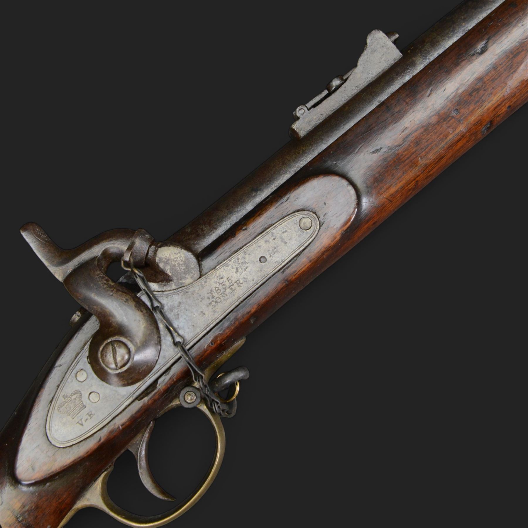 19th century Enfield percussion rifle, the 99cm barrel with three barrel bands, fore sight and rear sight, ramrod under, full walnut stock with brass butt, carrying sling brackets, action marked '1855 Tower' with Victoria cypher, overall L138cm