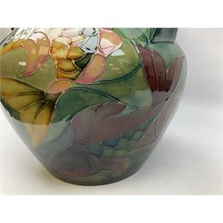 Large Moorcroft twin handled vase of baluster form decorated in the carp pattern, on a green ground, with original box and impressed marks and painted signature beneath, H34cm