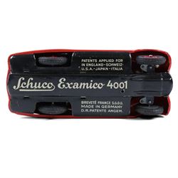 Schuco Examico 4001 tinplate clockwork car, in red with burgundy interior, with key and instructions, boxed