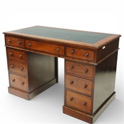 Victorian mahogany pedestal desk, rectangular moulded top inset with green leather writing surface with gilt tooling, fitted with three frieze drawers above opposing pedestals each fitted with three drawers, all with turned wooden knob handles, plinth bases