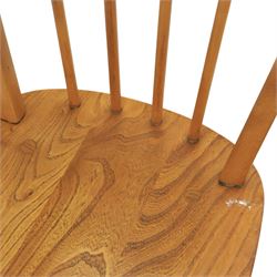 Ercol - set of four 'Windsor' waxed elm chairs, with hoop back design, on tapering supports