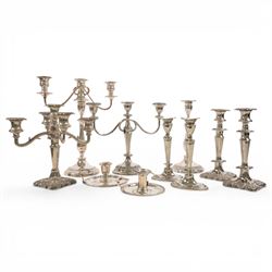 Silver plate two branch candelabra with grape vine decoration to the base, together with a...