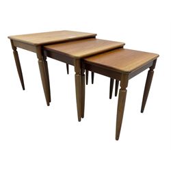 G-Plan - teak nest of three tables, rectangular top raised on turned supports