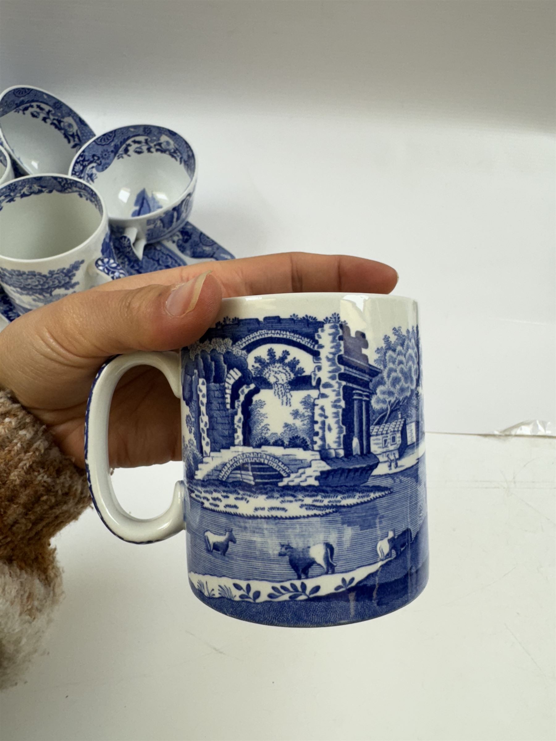 Spode Italian pattern tea service, comprising teapot, milk jug, open sucrier, six cups and saucers, two coffee cans and saucers, six dessert plates, four mugs and a sandwich plate (30) 