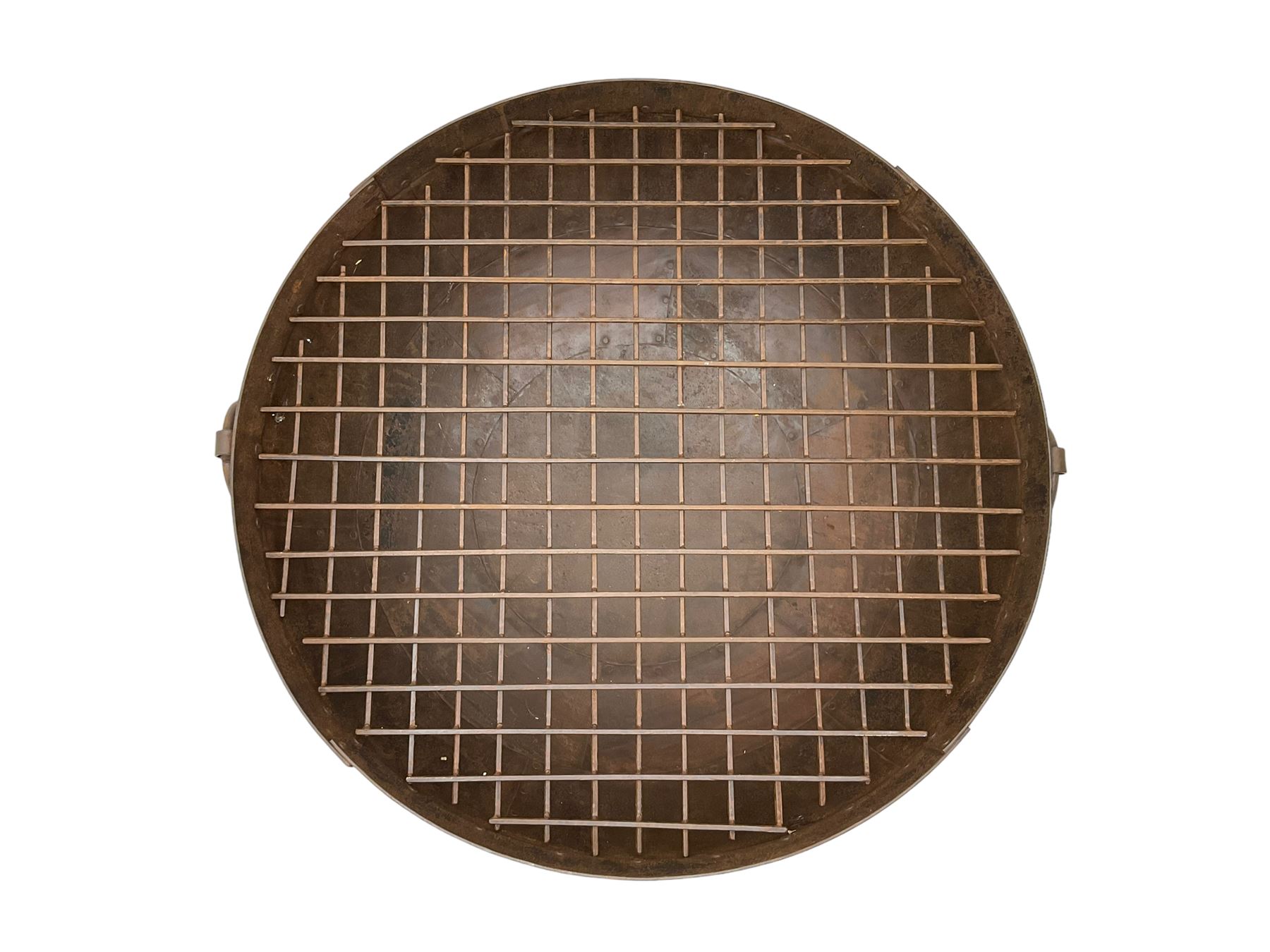 Circular riveted iron fire pit, strapwork sides with twin handles on stand, with grate