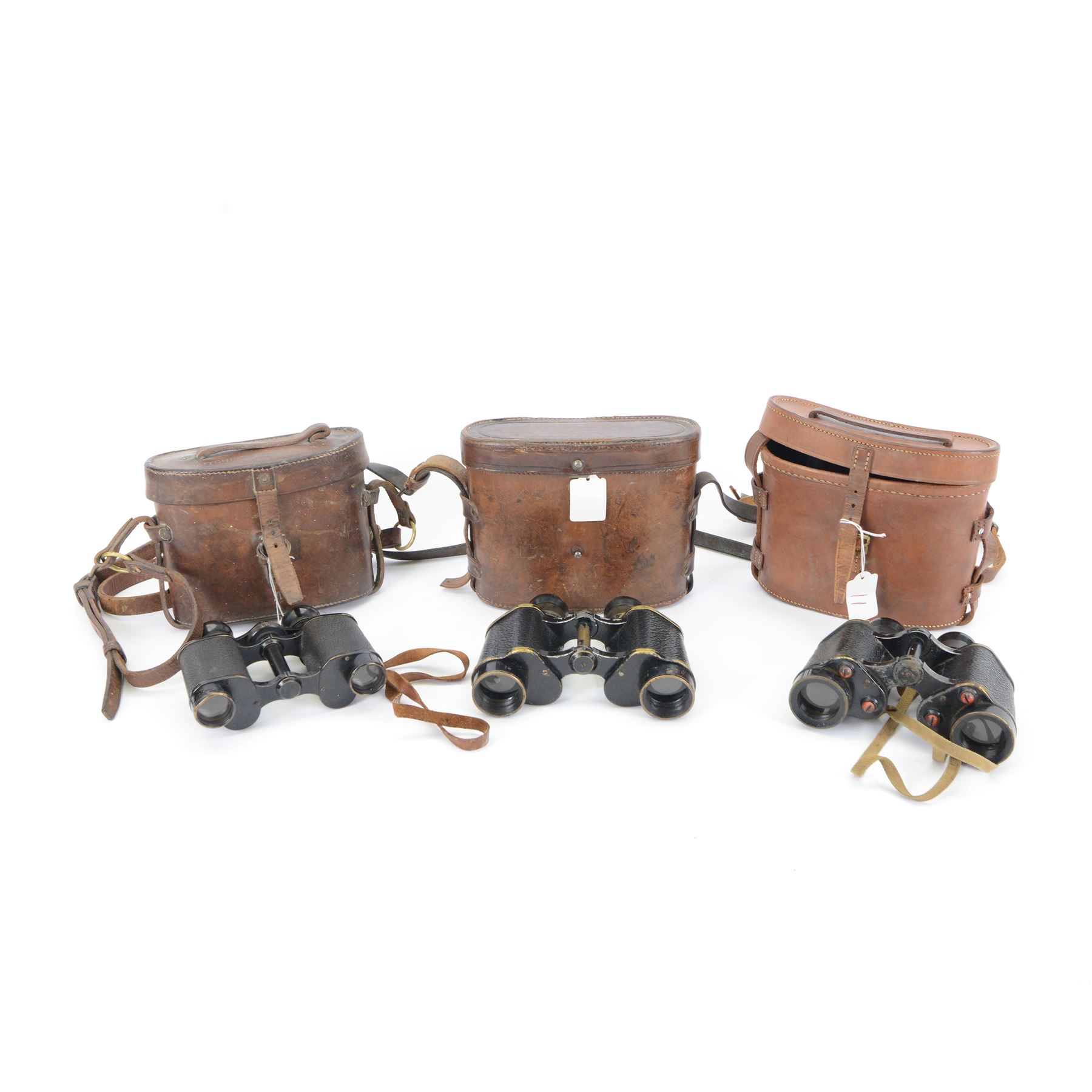 WWII Taylor-Hobson OS420 MA Bino Prism No.2 MK III x6 binoculars, the body marked with broad arrows, the case marked 6E/293 AM, togethter with another pair of Taylor-Hobson OS308 GA Bino Prism No.2 MK.II x6 cased and one other pair of binoculars 