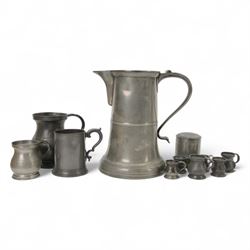 19th century Pewter tavern jug, with WR beneath a crown touch mark, together with pewter t...