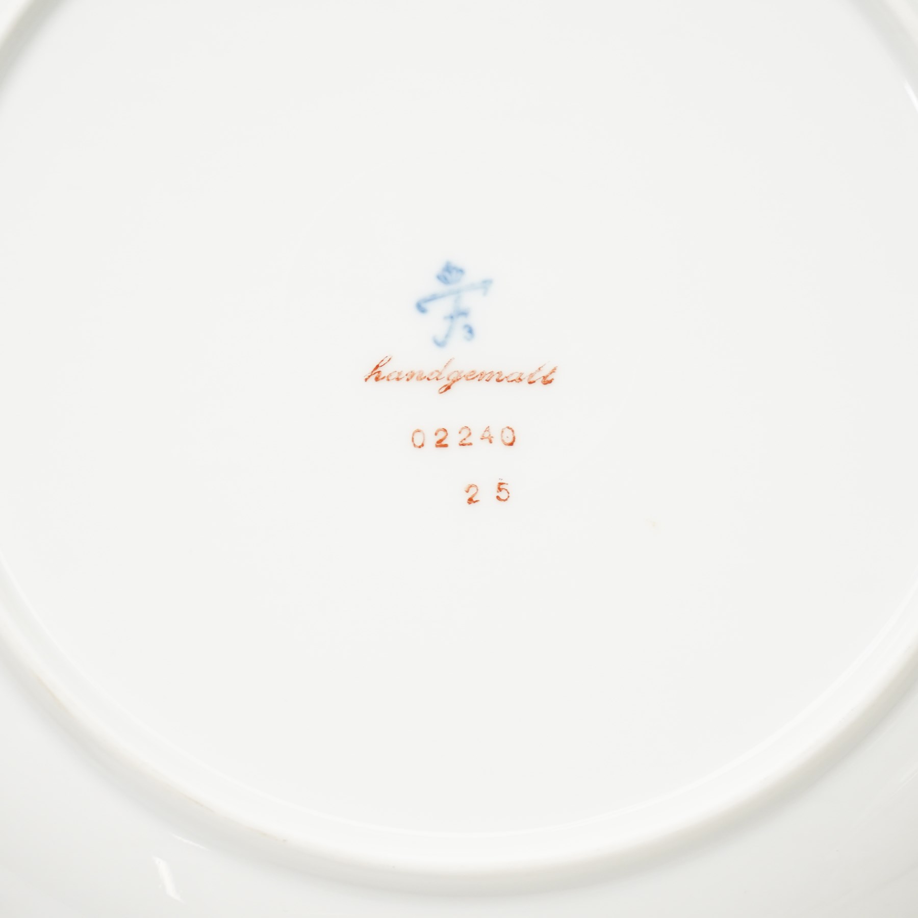 Furstenberg tea service decorated with sprays of flowers within a gilt rim comprising twelve cups and saucers, twelve plates, tea pot, hot water jug, milk jug, sugar bowl and cover and cake plate