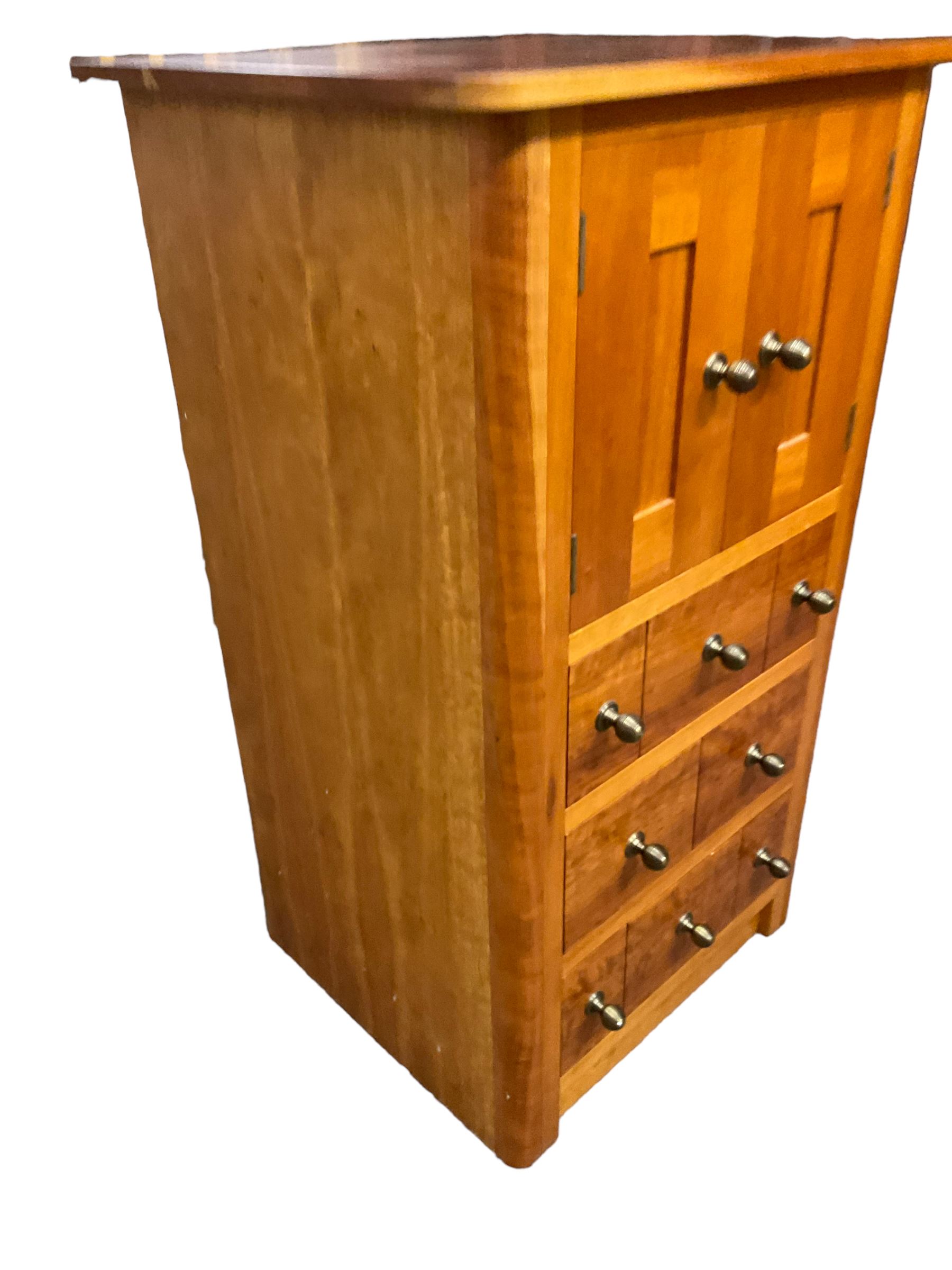 Cherry wood cabinet, fitted with double cupboard over two short and two long drawers, with faux drawer facias