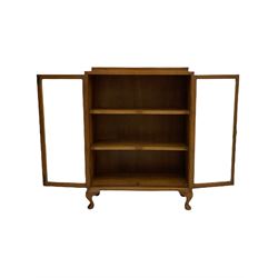 Mid 20th century oak bookcase, fitted with two glazed doors