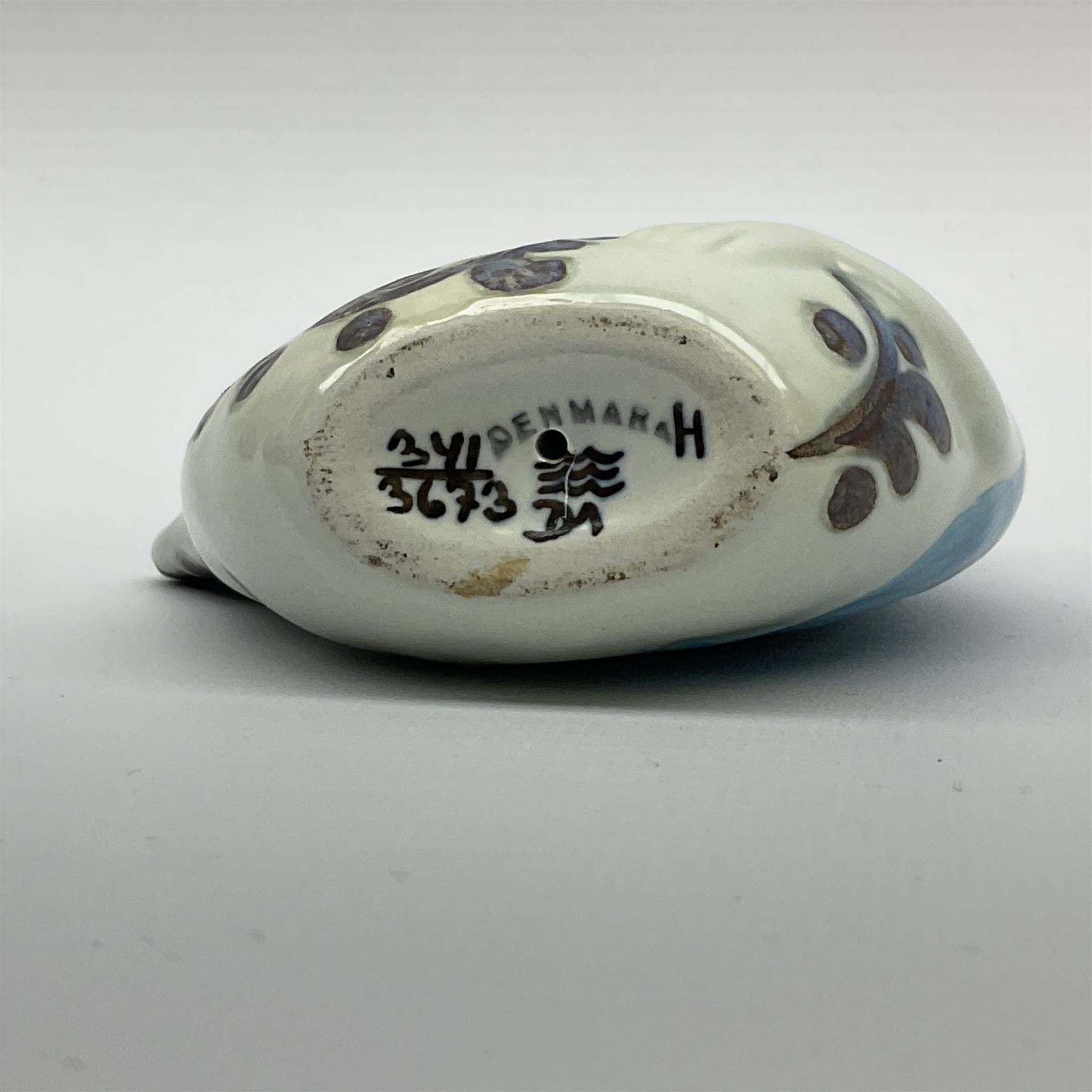 A Doreen Middelboe for Royal Copenhagen Aluminia figure, modelled as a mermaid, with printed and painted marks beneath, H10.5cm.