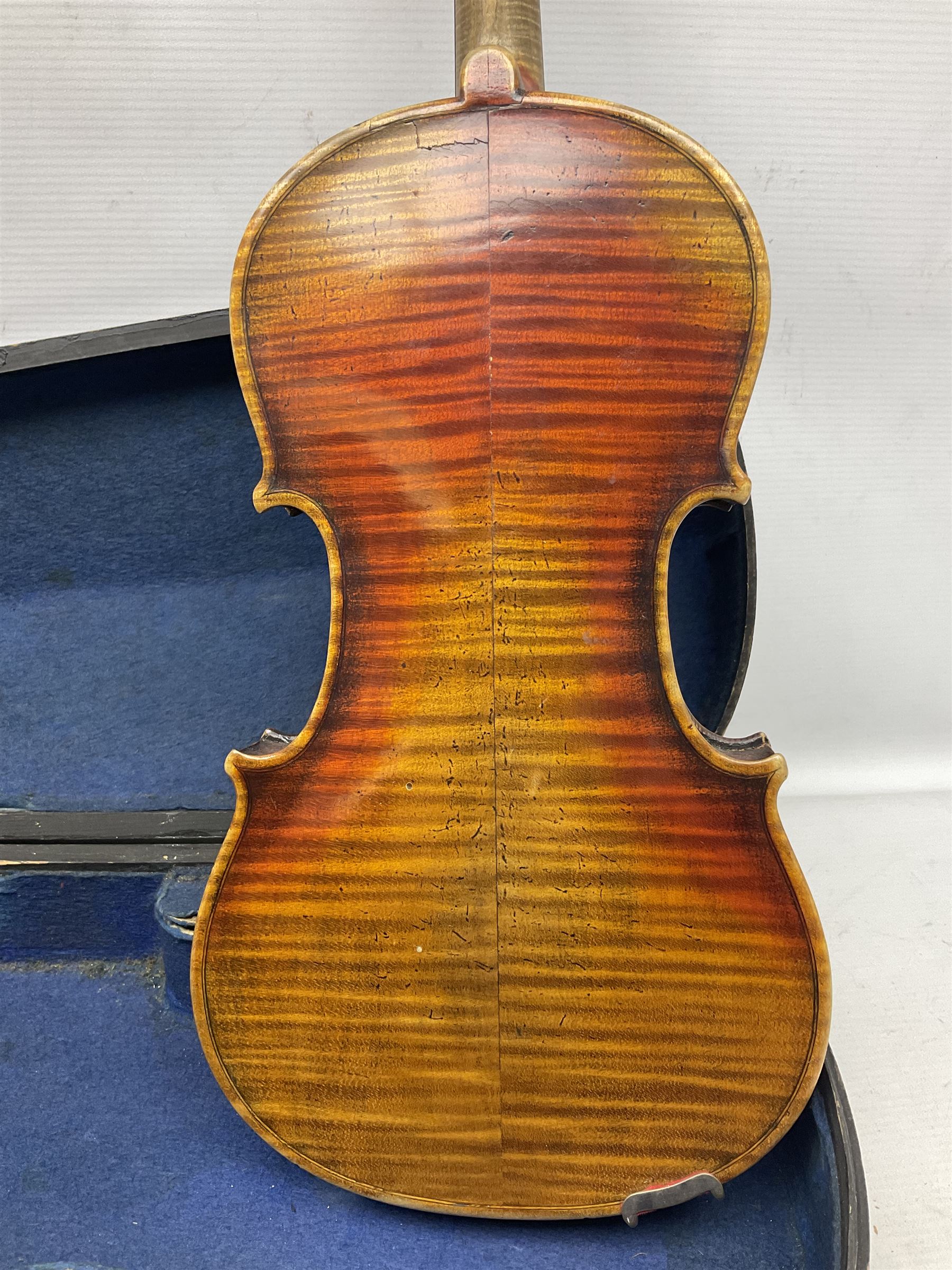 Late 19th century French three-quarter size 'Conservatory' violin with 34cm two-piece maple back and ribs and spruce top, the peg box inscribed 'Conservatory Violin Straduari', bears label 'Antonius Stradiuarius Cremonensis Faciebat Anno 1721' L55.5cm overall; in ebonised wooden 'coffin' case