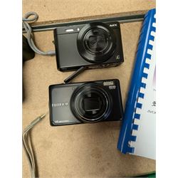 Panasonic Lumix DMC-LF1 digital camera, with charger and instruction booklet, together with a Minolta Dynax 5000i SLR camera body with a Minolta AF Zoom 35-80mm 1:4 (22)-5.6 lens, and a Fujifilm Finepix T digital camera