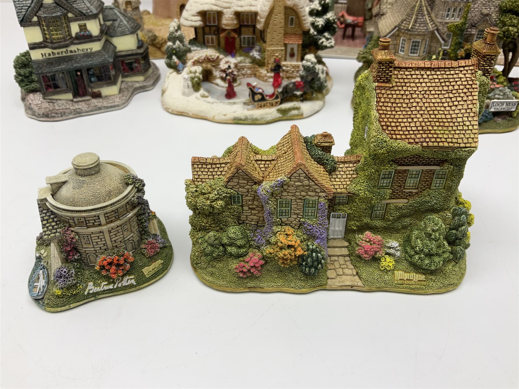 Ten Lilliput Lanes, to include Sleigh Bells, Short Back and Sides, Crook Hall Gardens, Loch Ness Lodge, Le Petit, etc, nine with original boxes  (10)