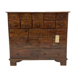 Hardwood chest fitted with eighteen drawers