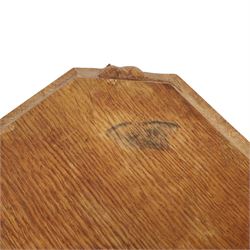 Mouseman - oak chopping board, of canted octagonal form, with carved mouse signature, by the workshop of Robert Thompson of Kilburn