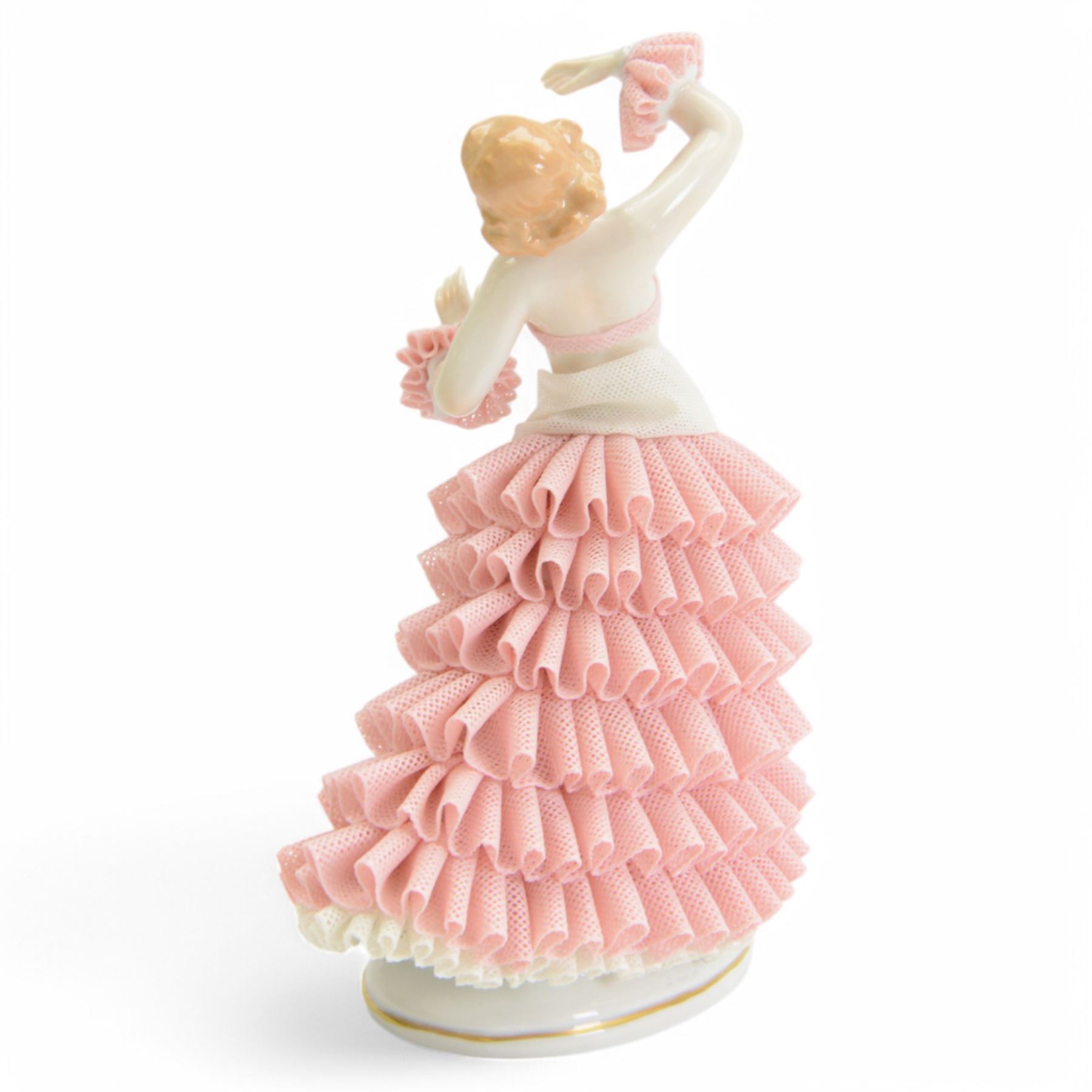 Three Continental lace figures, to include a Sitzendorf example modelled as a dancer with lace skirt, top and cuffs, upon a gilt detailed base, with printed mark beneath, H22cm 