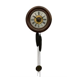 A German 30-hour chain driven wooden framed Postman’s Alarm clock, sounding on a bell, with internal wooden movement plates and brass train wheels, 7” chapter ring with roman numerals, minute track and half hour markers, with steel hands (minute hand a replacement) and alarm setting disc to the centre, with a 10-1/2” oak bezel and hinged side viewing doors. With weights and pendulum.




