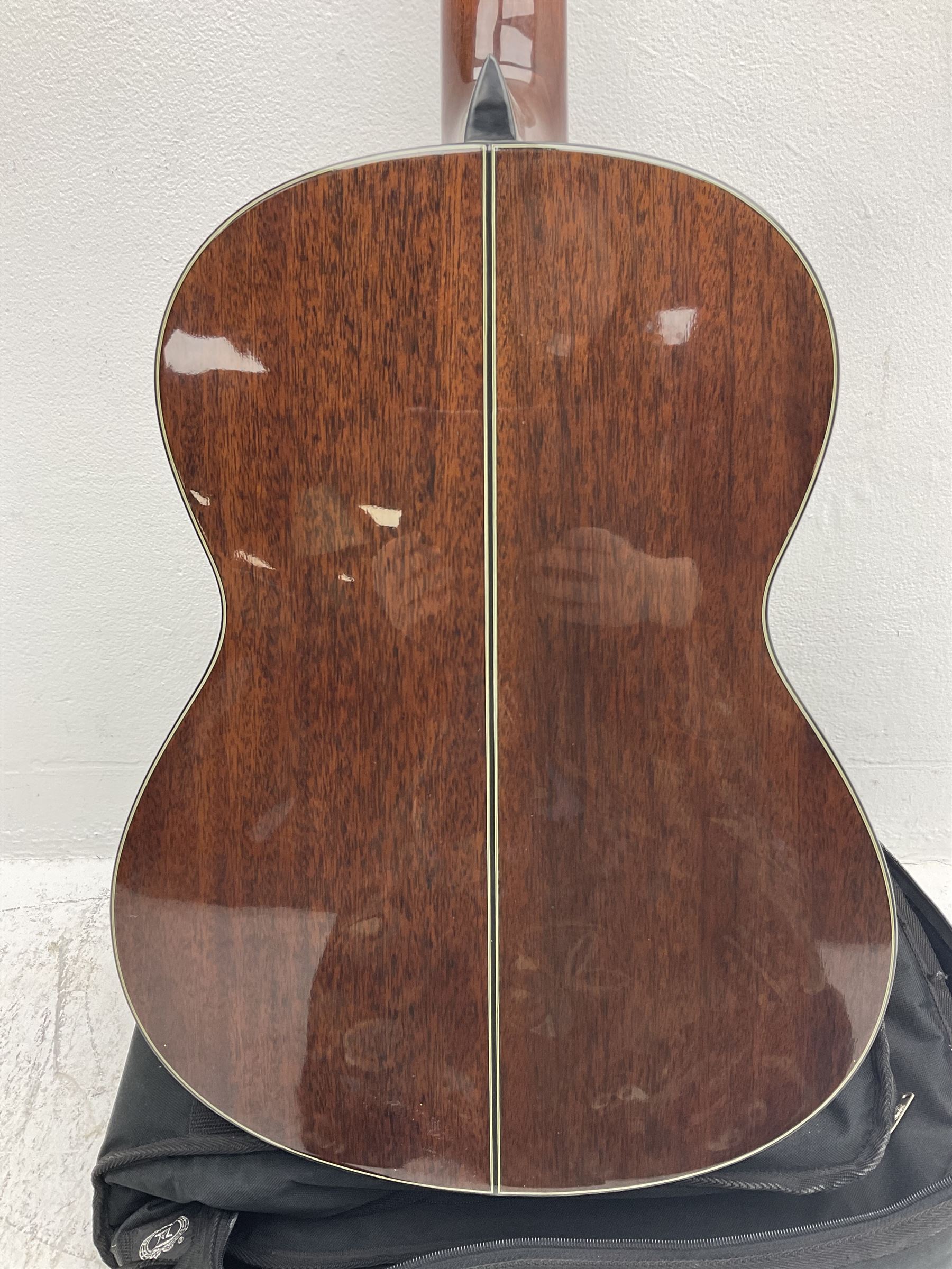 Nagoya Suzuki Model SC240 acoustic guitar with mahogany back and ribs and spruce top, bears label, L101cm; in soft carrying case