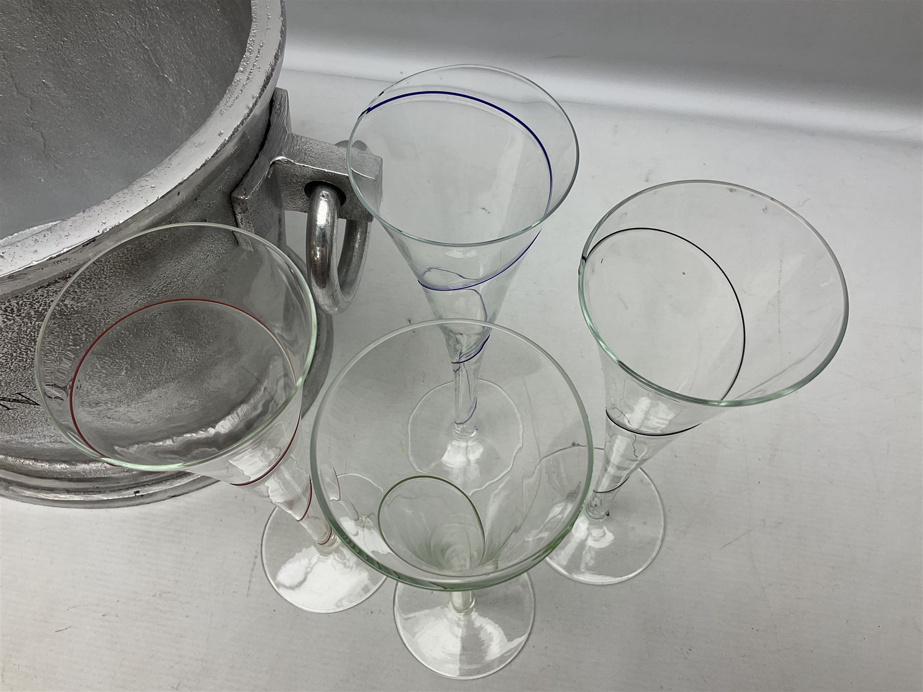 Aluminium champagne bucket detailed Cuvee de Prestige Champagne du Louvois, with twin ring handles, together with quantity of glasses, bucket L38cm