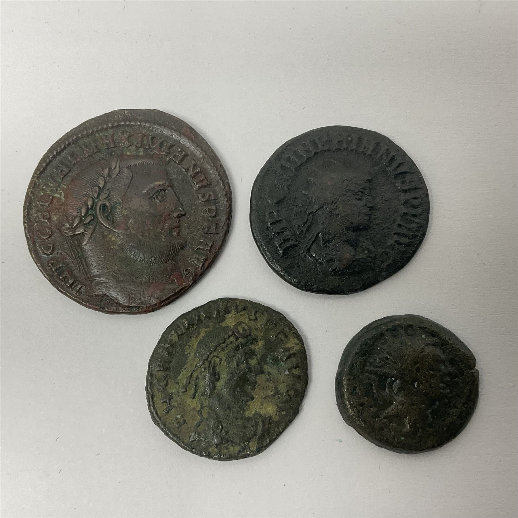 Ancient Roman Coinage, group of seventeen bronze and copper-alloy coins to include Maximianus and Galeria Valeria, along with an unidentified 76% silver round, overall weight 14g