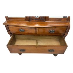 Victorian walnut dresser, projecting cornice over mirrored front, fitted with two short over two long drawers, on turned feet