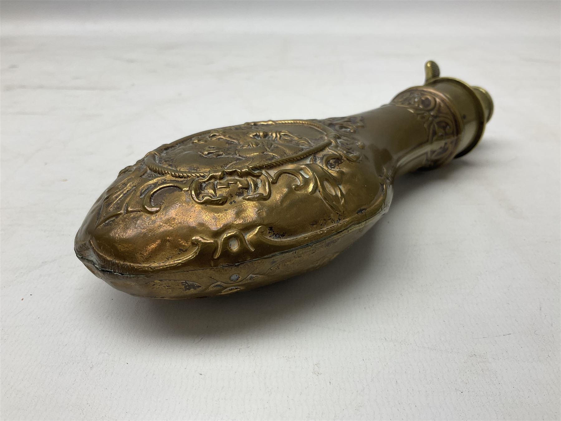 Copper and brass powder flask by G. & J.W. Hawksley Sheffield with embossed panel of 'Pharaohs Horses' to one side H21cm