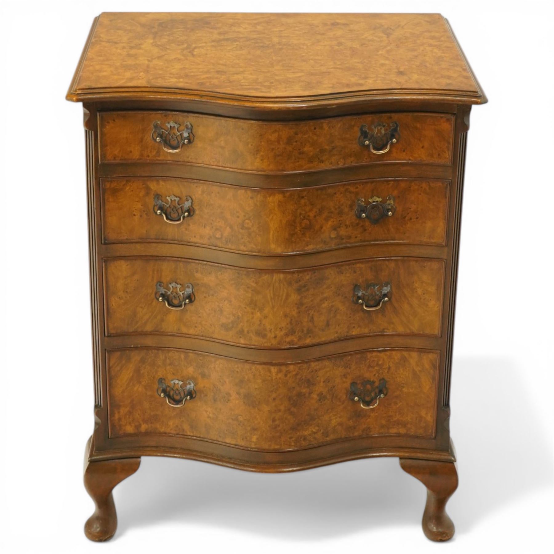 Queen Anne design figured walnut serpentine-front chest, fitted with four graduating cock-beaded drawers flanked by canted fluted uprights, on cabriole feet
