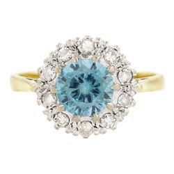 18ct gold blue zircon and diamond cluster ring, single round cut blue zircon surrounded by...
