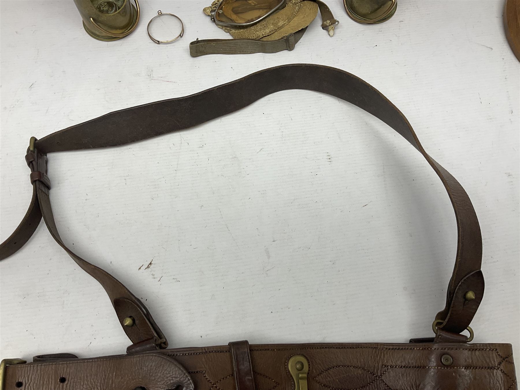 British Army Sam Brown leather belt with Turkish markings; New Zealand Land Forces officer's commission certificate dated 1919; WWII small pair of trench art brass helmet shaped scuttles; and other items